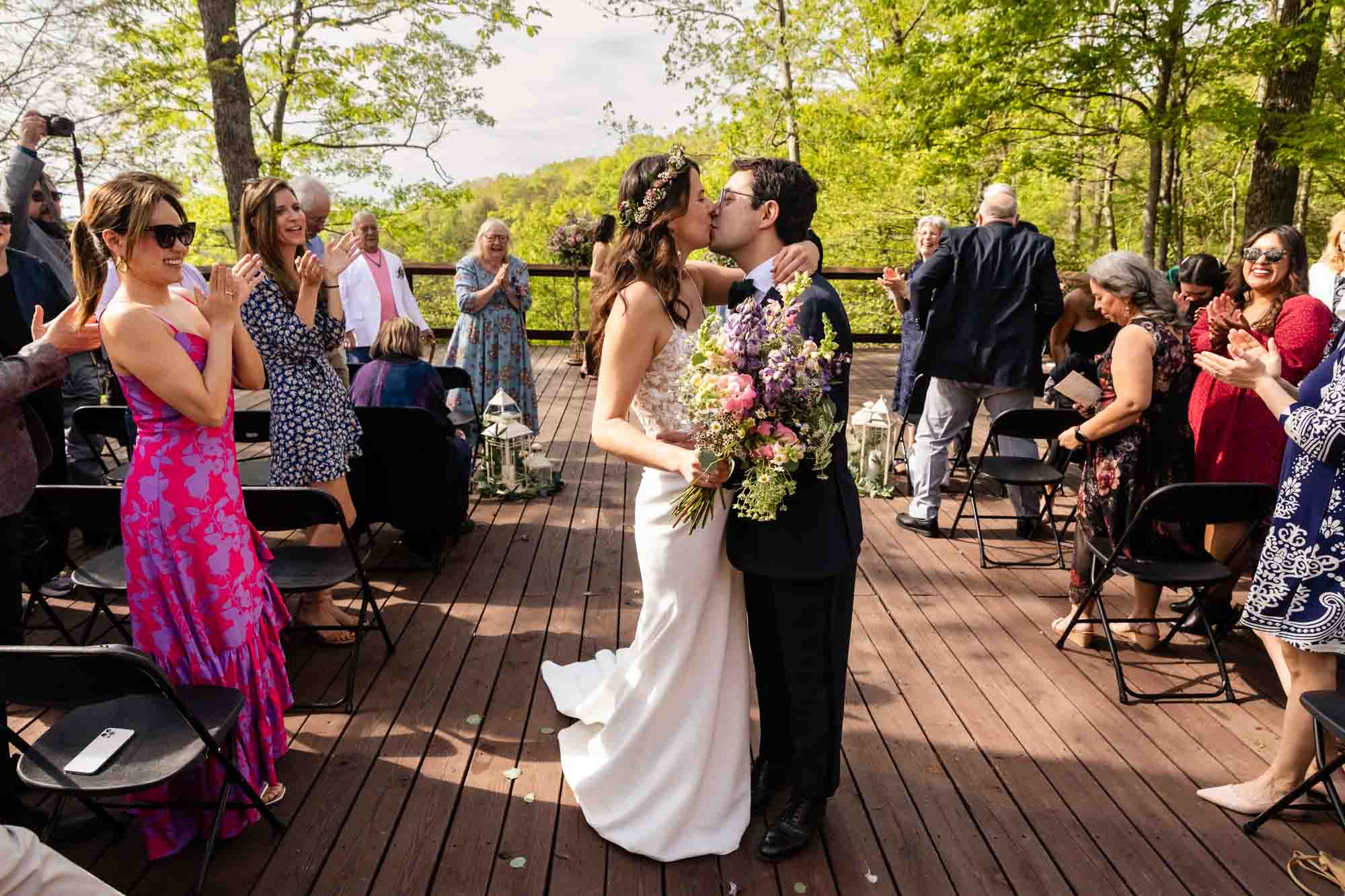 bride and groom kissing at their relaxed outdoor wedding, taken by pittsburgh documentary wedding photographer